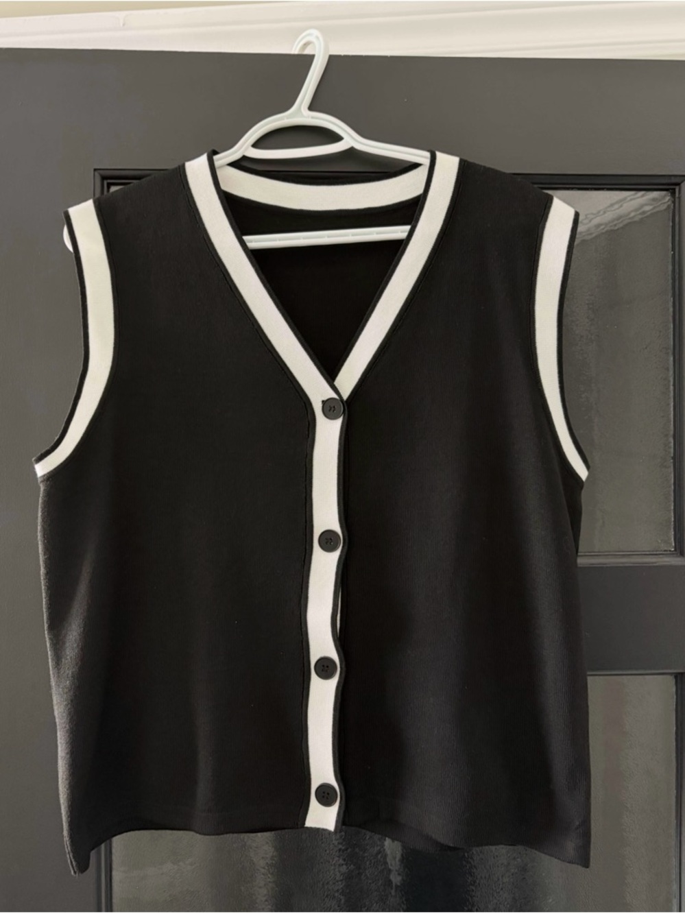 Black Sleeveless Button Front Vest with White Trim